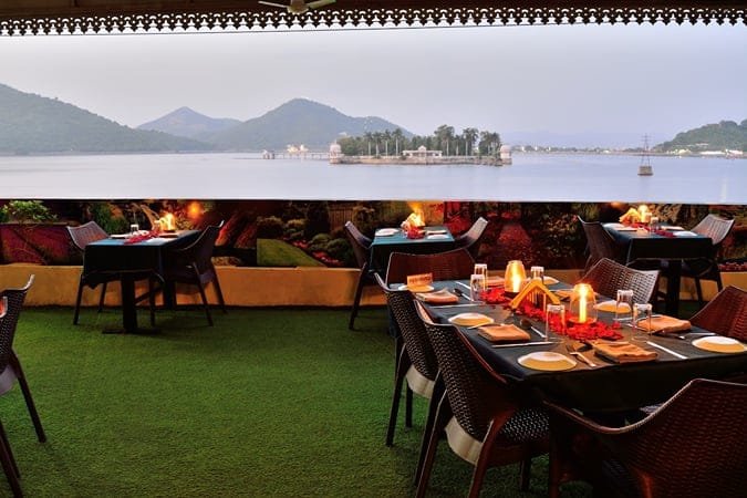 Rani Road lake-view restaurant outdoor dining tables set facing Lake Pichola